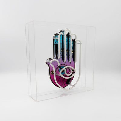 TOM NEON Glas Neon Box 'All Seeing Eye'. Einzigartiges Neondesign mit dem Motiv des allsehenden Auges, eingebettet in einer eleganten Glasbox. Perfekte Wahl für eine mystische und stilvolle Raumdekoration.