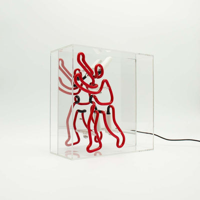 TOM NEON Glas Neon Box 'Buchmann'. Leuchtendes Neonlicht mit einem Buchmotiv, eingebettet in einer eleganten Glasbox. Perfekt für eine stilvolle und literarische Raumdekoration.